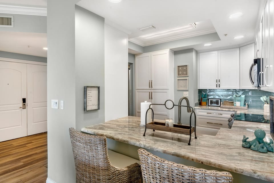 Condo, Multiple Beds (Indigo East 303) | Private kitchen | Oven, toaster, paper towels