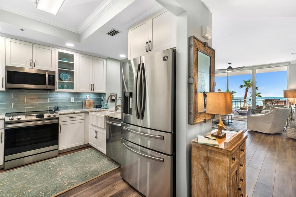 Condo, Multiple Beds (Indigo East 303) | Private kitchen | Oven, toaster, paper towels