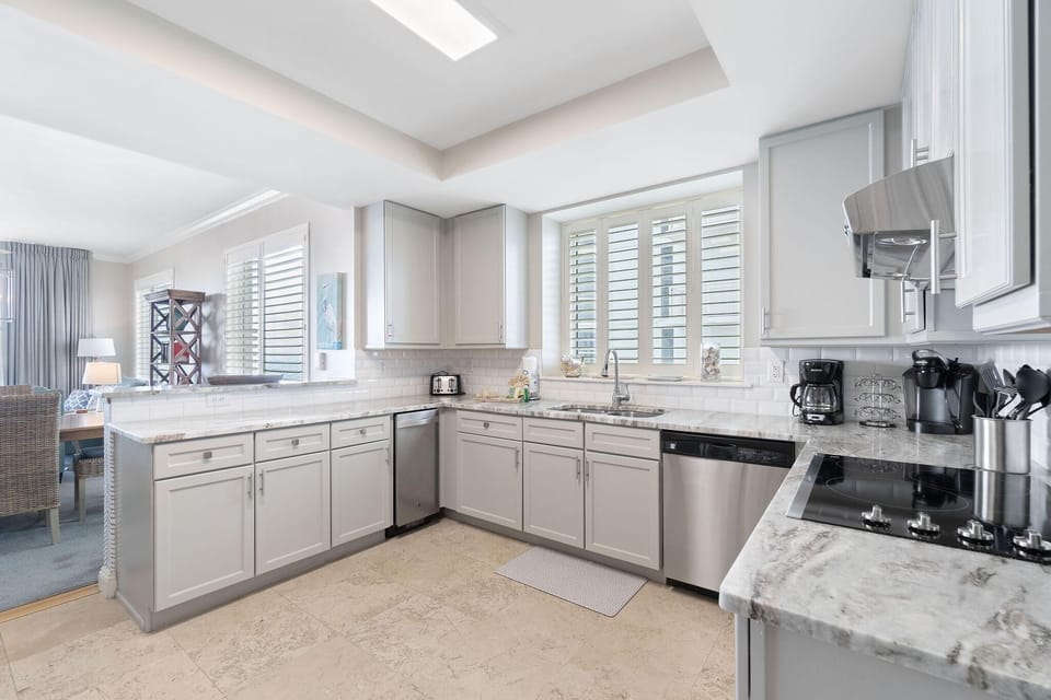 Condo, Multiple Beds (Indigo West 1104) | Private kitchen | Oven, toaster, paper towels