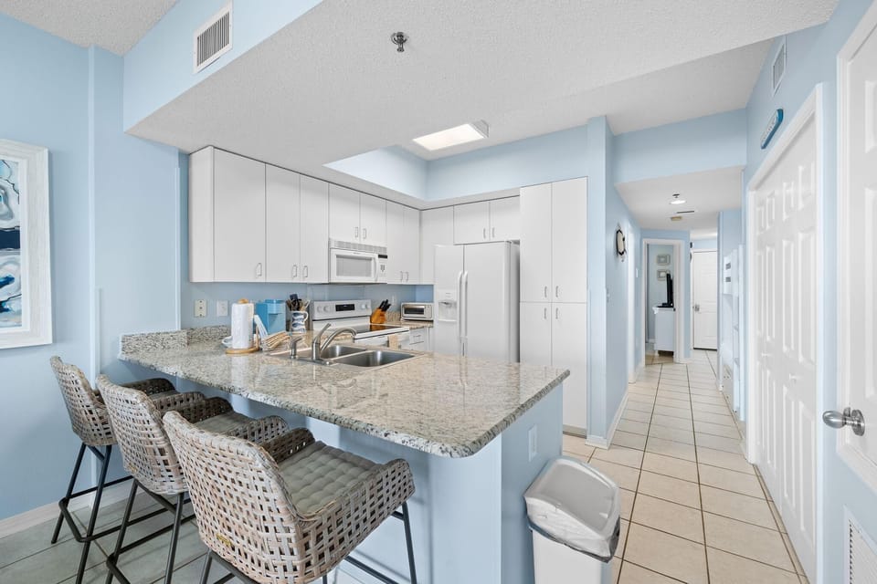 Condo, 1 Queen Bed (Tidewater 503) | Private kitchen | Oven, toaster, paper towels