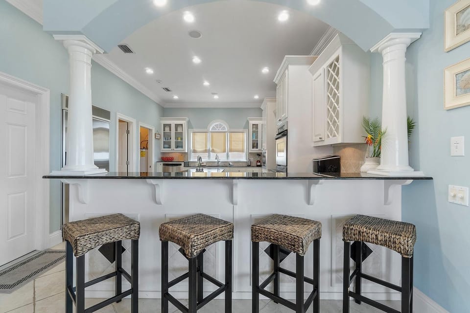 House, Multiple Beds (Whispering Palms Beach House) | Private kitchen | Oven, toaster, paper towels