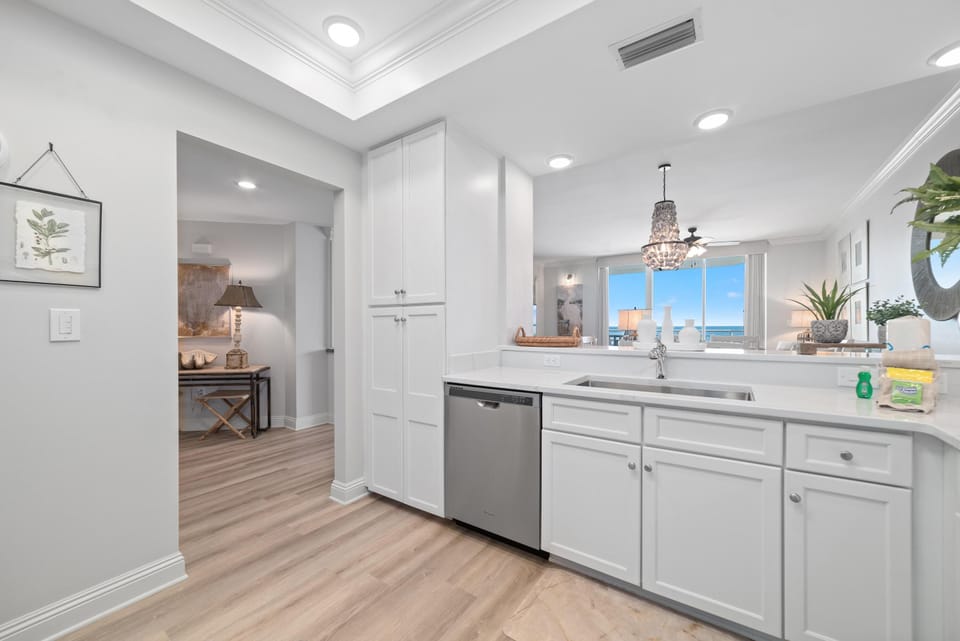 Condo, Multiple Beds (Indigo East 802) | Private kitchen | Oven, toaster, paper towels