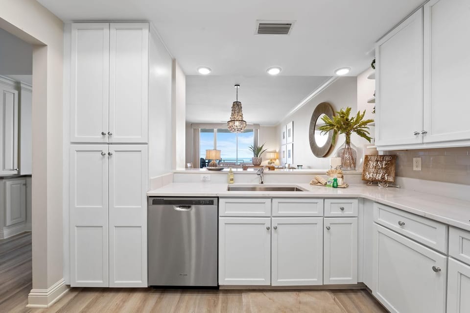 Condo, Multiple Beds (Indigo East 802) | Private kitchen | Oven, toaster, paper towels