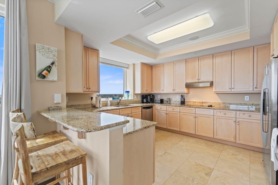 Condo, Multiple Beds (Indigo East 1006) | Private kitchen | Oven, toaster, paper towels