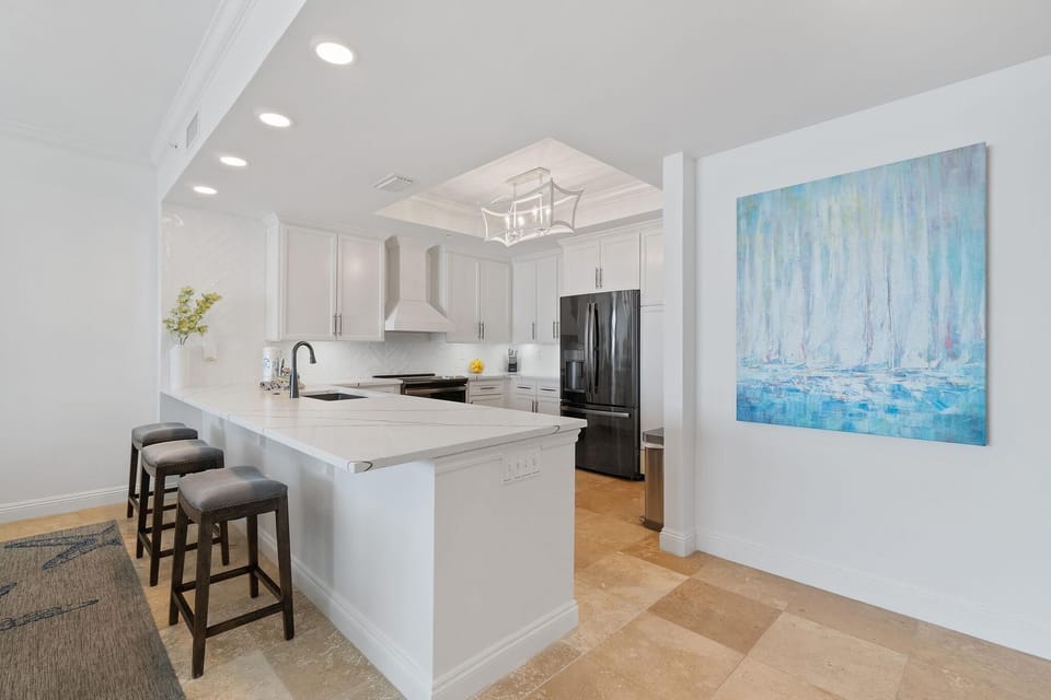 Condo, Multiple Beds (Indigo East 1502) | Private kitchen | Oven, toaster, paper towels