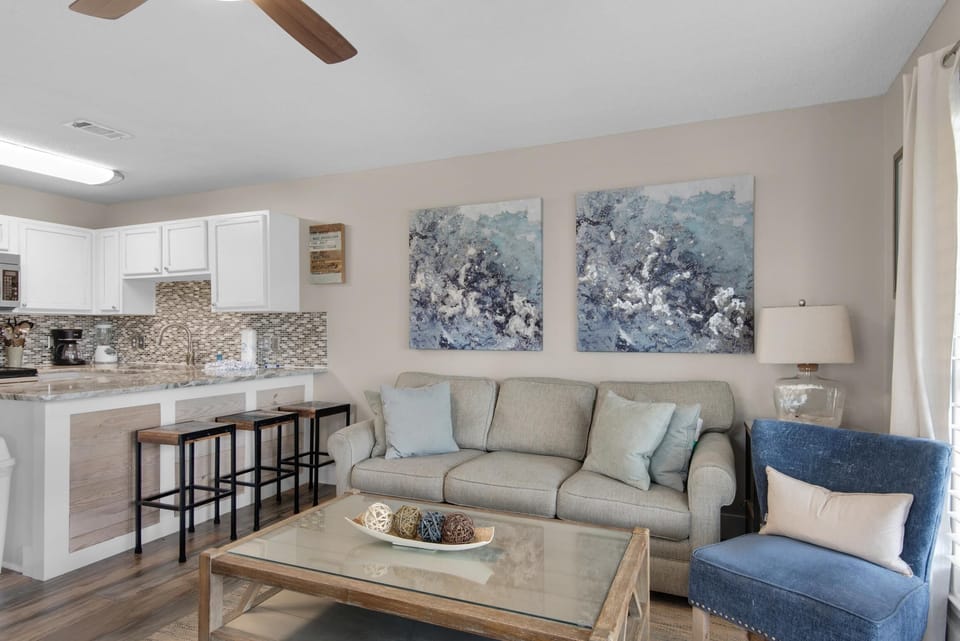 Condo, 1 Queen Bed with Sofa bed (Grand Caribbean West 111- Just Beach ) | Living area | TV