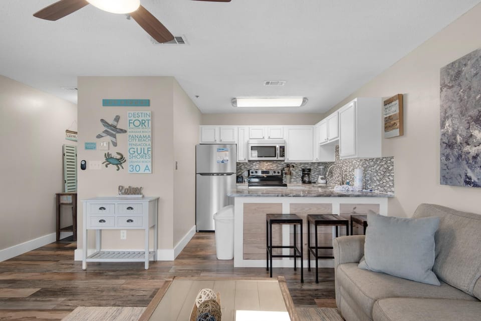 Condo, 1 Queen Bed with Sofa bed (Grand Caribbean West 111- Just Beach ) | Living area | TV