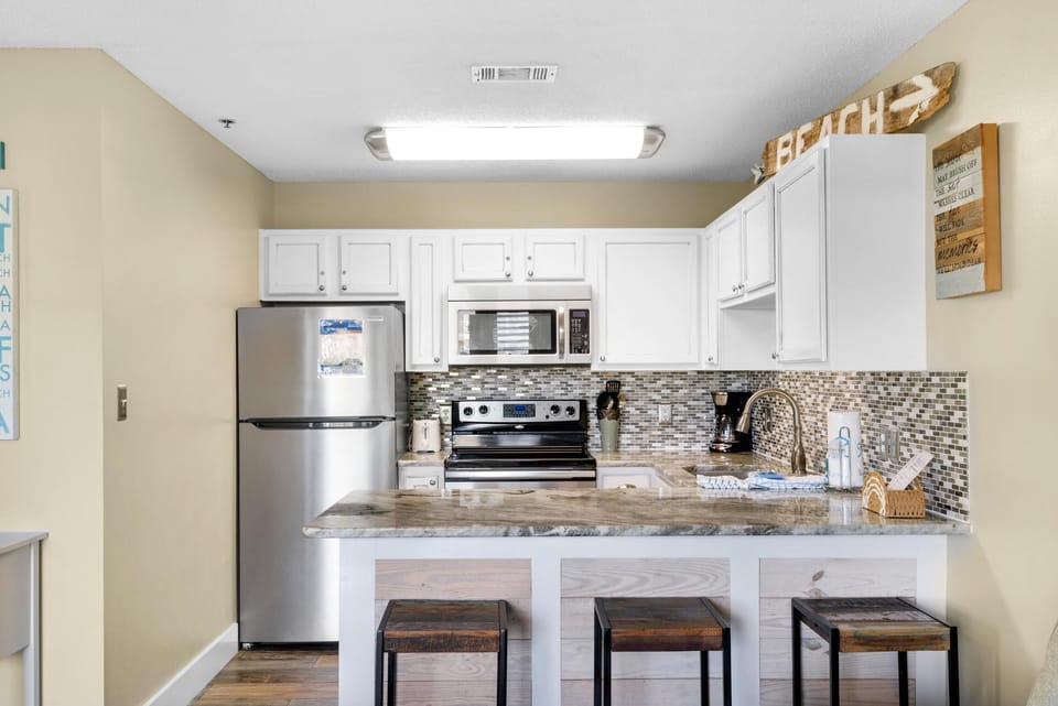 Condo, 1 Queen Bed with Sofa bed (Grand Caribbean West 111- Just Beach ) | Private kitchen | Oven, toaster