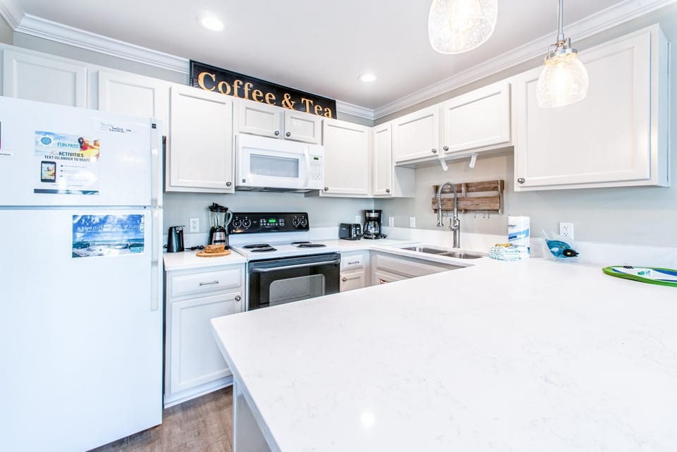 Condo, Multiple Beds (Grand Caribbean East 106) | Private kitchen | Oven, toaster