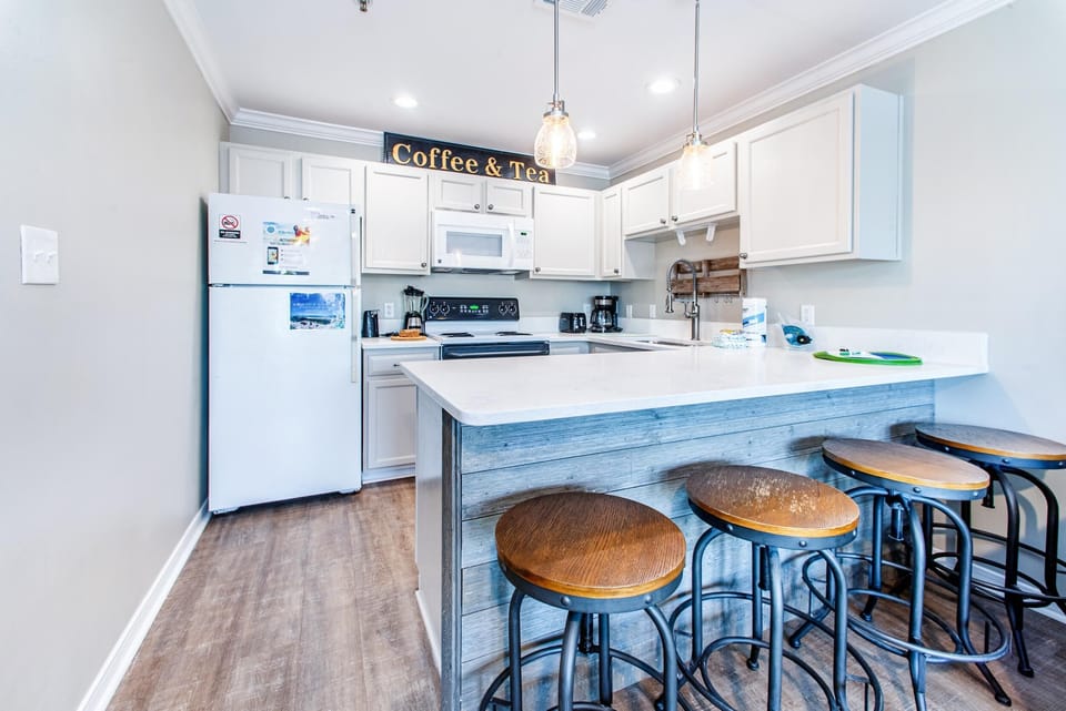 Condo, Multiple Beds (Grand Caribbean East 106) | Private kitchen | Oven, toaster