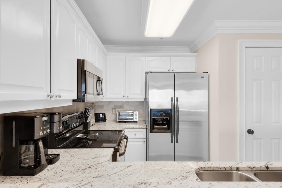 Condo, Multiple Beds (Crystal Dunes 304) | Private kitchen | Oven, toaster