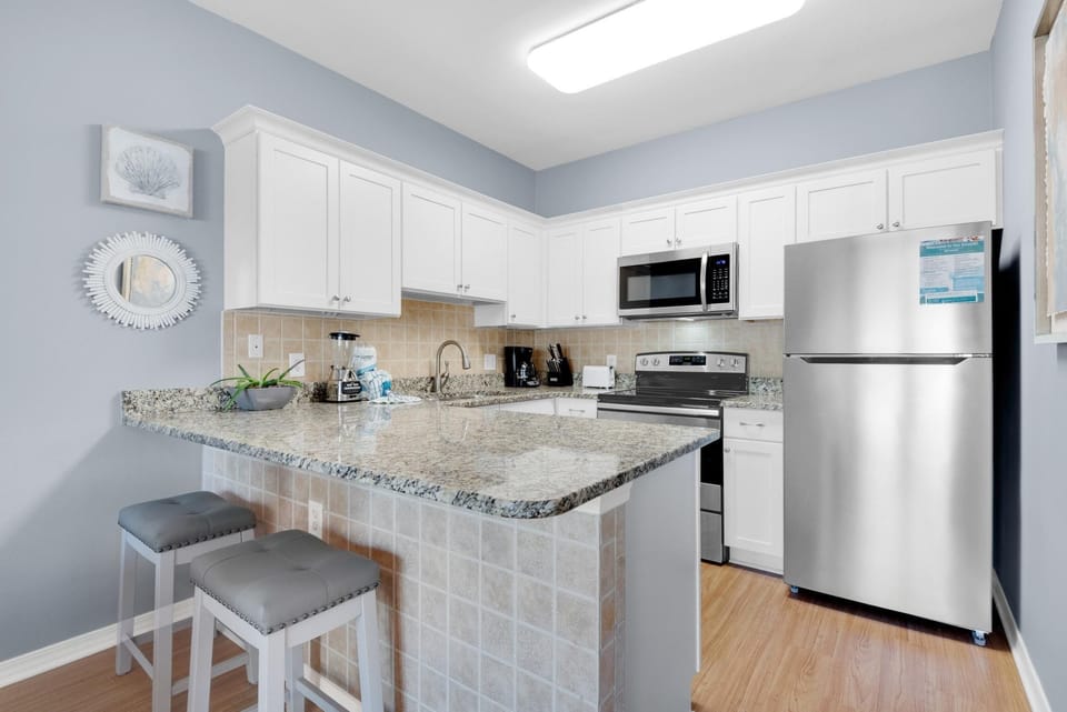 Condo, 1 King Bed with Sofa bed (Caribbean Dunes 121) | Private kitchen | Oven, toaster