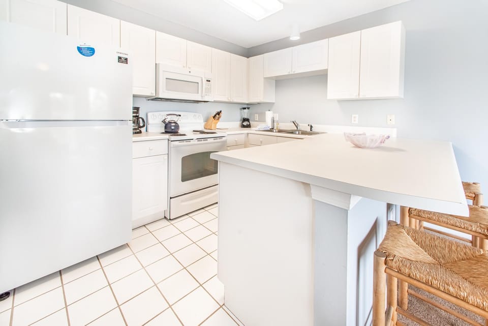 Condo, Multiple Beds (Gulf Place Caribbean 309) | Private kitchen | Oven, toaster