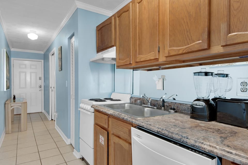 Condo, 1 King Bed with Sofa bed (Polynesian Village 211) | Private kitchen | Oven, toaster