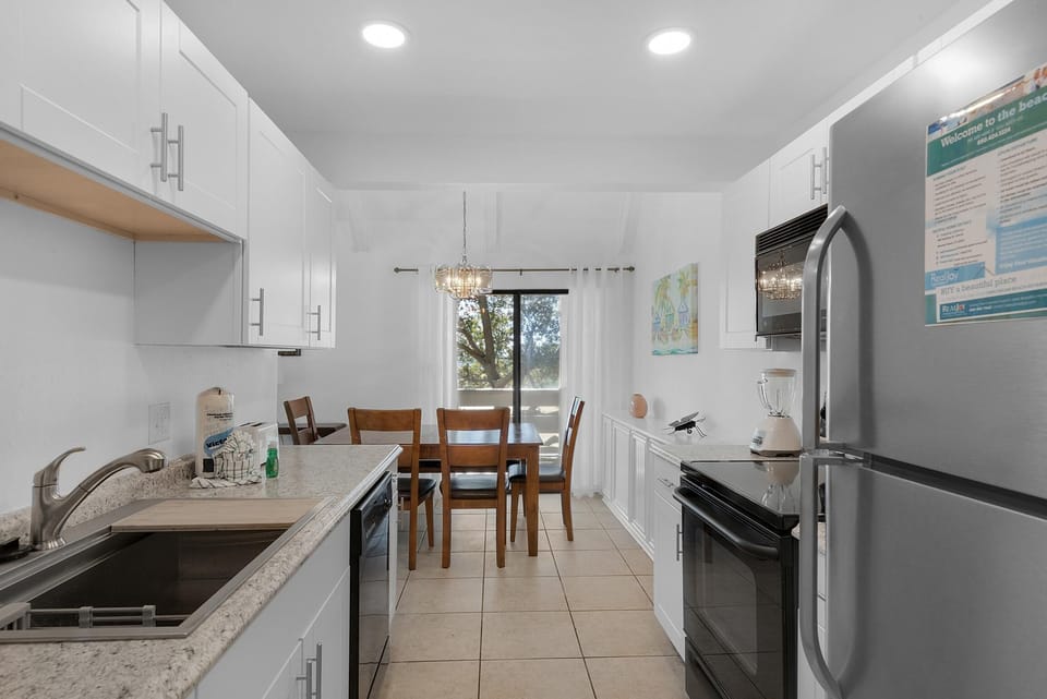 Condo, Multiple Beds (Beachy Keen) | Private kitchen | Oven, toaster