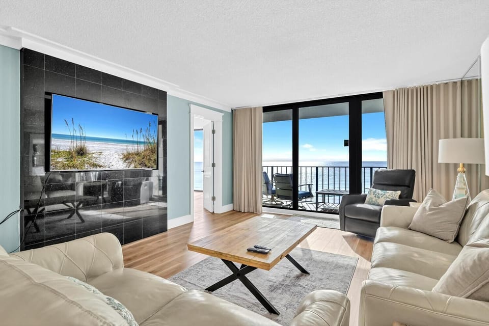 Condo, 1 King Bed with Sofa bed (Edgewater Tower 2-404) | Living area | TV