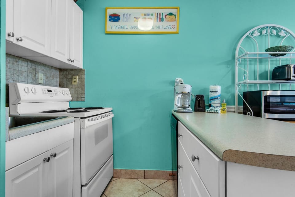 Studio, 1 Queen Bed with Sofa bed (Top of the Gulf 210) | Private kitchen | Oven, toaster