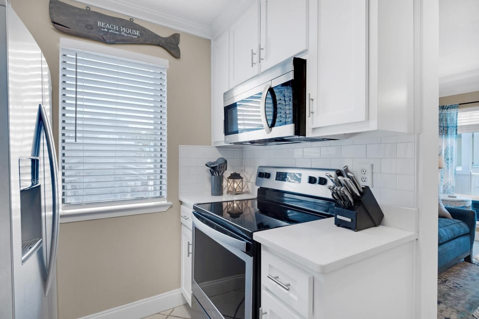 Condo, 1 King Bed with Sofa bed (Nautical Watch E-4) | Private kitchen | Oven, toaster