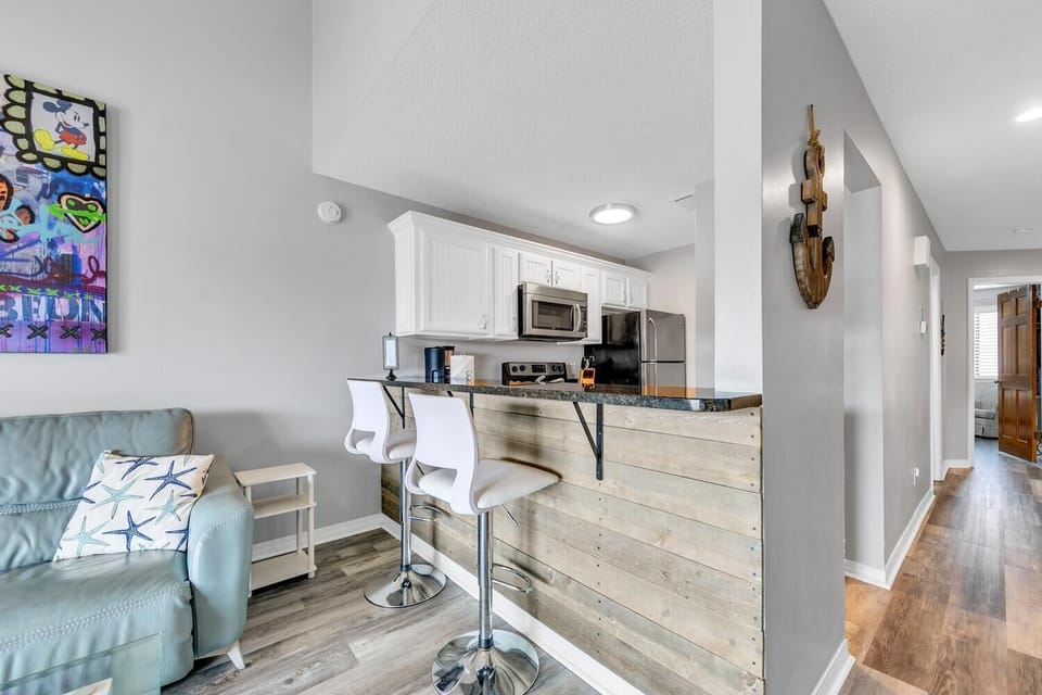 Condo, 2 Queen Beds (St Thomas Square Villa 414) | Living area | TV