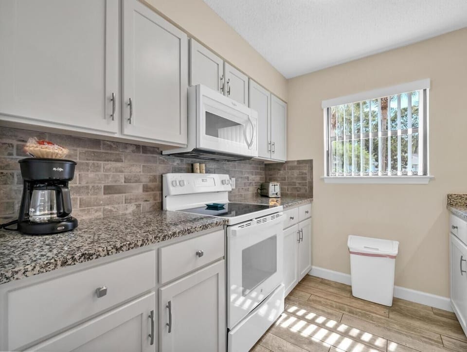 House, Multiple Beds (Cassine Gardens 273- Kwitcherbeachin') | Private kitchen | Oven, toaster
