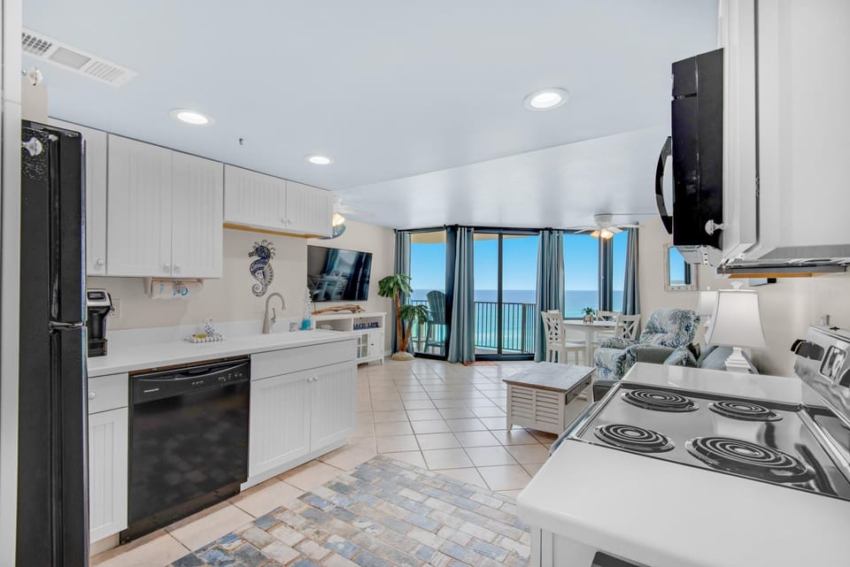Condo, 1 King Bed with Sofa bed (Sunbird 709W Beach Life) | Private kitchen | Oven, toaster