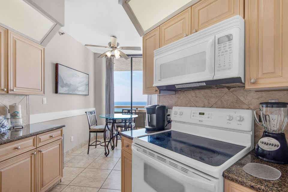Condo, Multiple Beds (Surfside Resort #1509) | Private kitchen | Oven, toaster