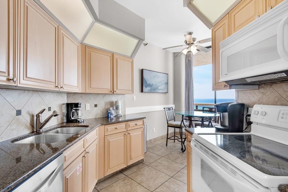 Condo, Multiple Beds (Surfside Resort #1509) | Private kitchen | Oven, toaster