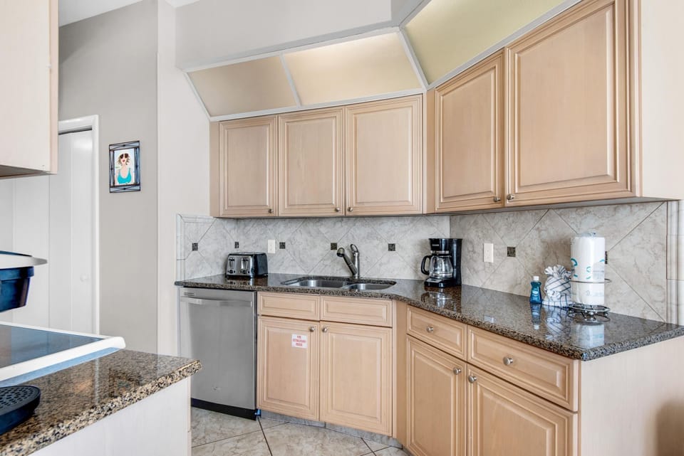 Condo, Multiple Beds (Surfside Resort #1509) | Private kitchen | Oven, toaster