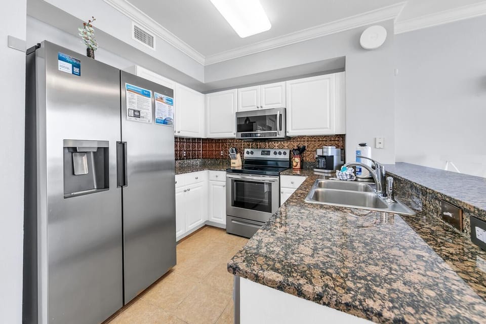 Condo, Multiple Beds (Tidewater 1113) | Private kitchen | Oven, toaster