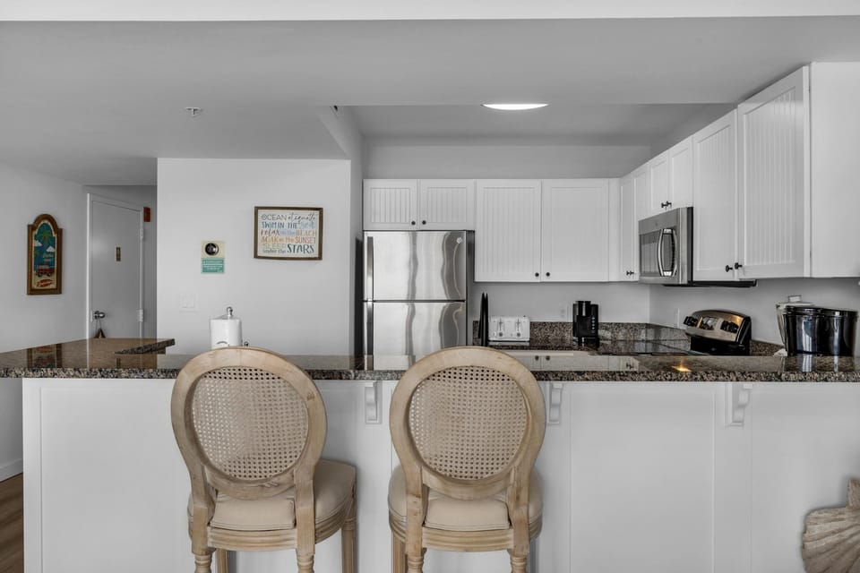 Condo, 1 King Bed with Sofa bed (Pelican Beach Resort 1207) | Private kitchen | Oven, toaster