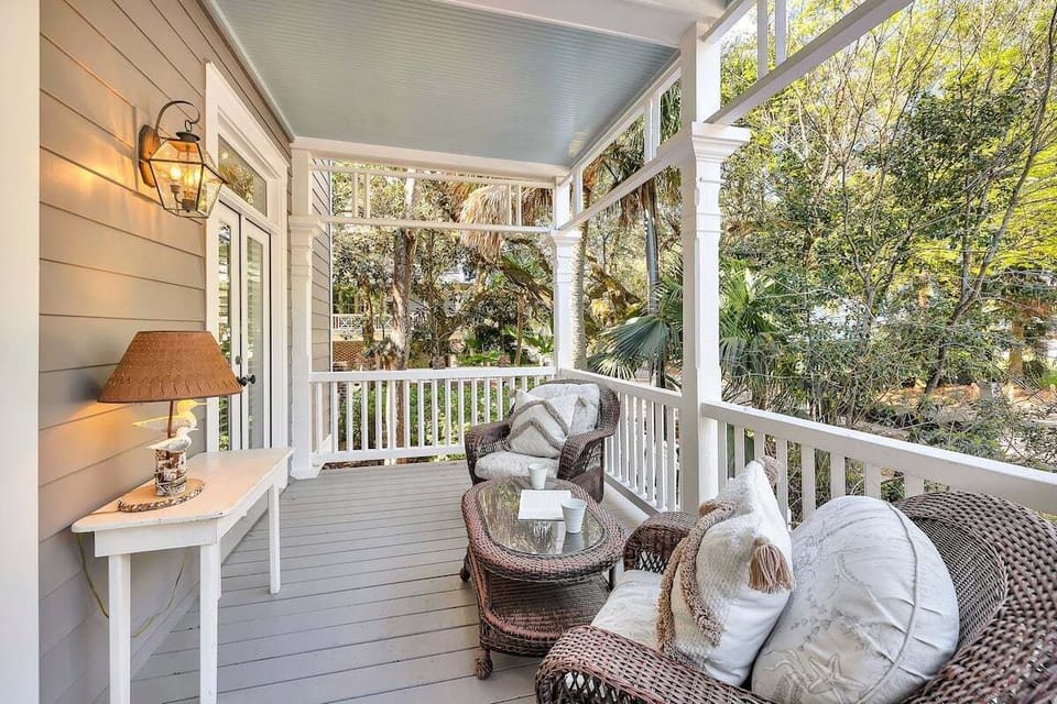 Balcony with seating and tables
