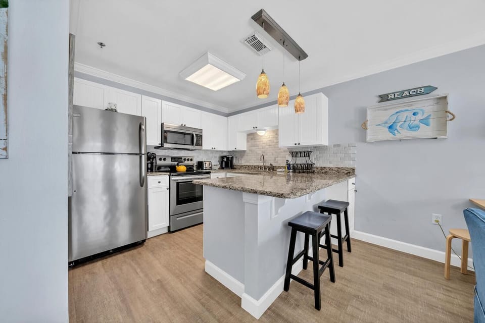 Condo, 1 Queen Bed with Sofa bed (Gulf Place Caribbean 311) | Private kitchen | Oven, toaster