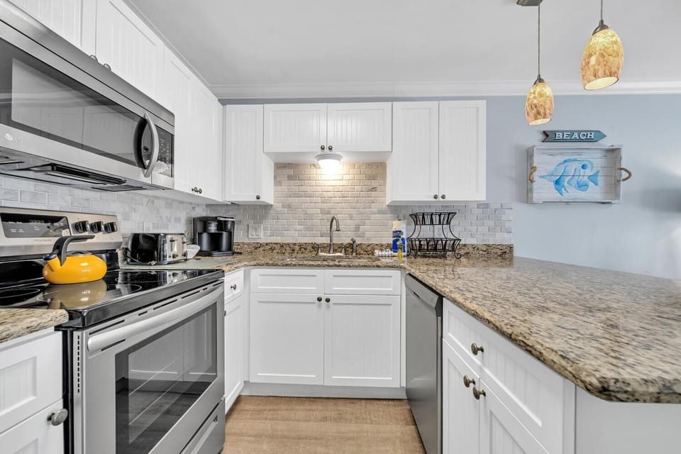 Condo, 1 Queen Bed with Sofa bed (Gulf Place Caribbean 311) | Private kitchen | Oven, toaster