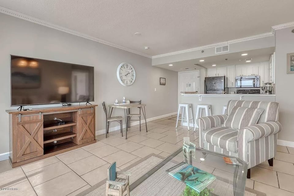 Condo, Multiple Beds (Long Beach Resort 1-105) | Living area | TV