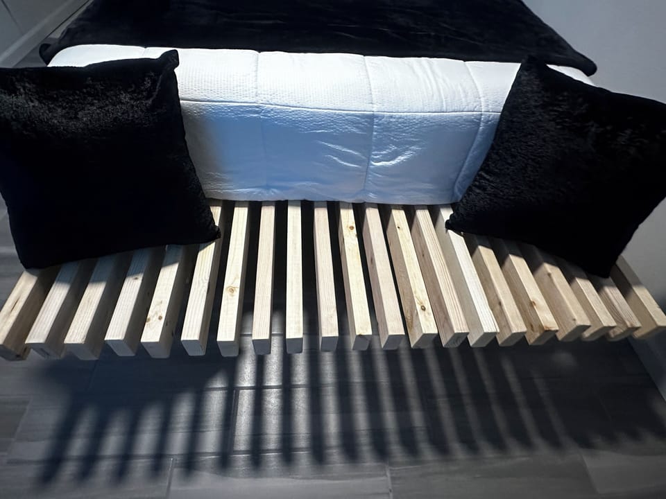 modern bench with decorative pillows