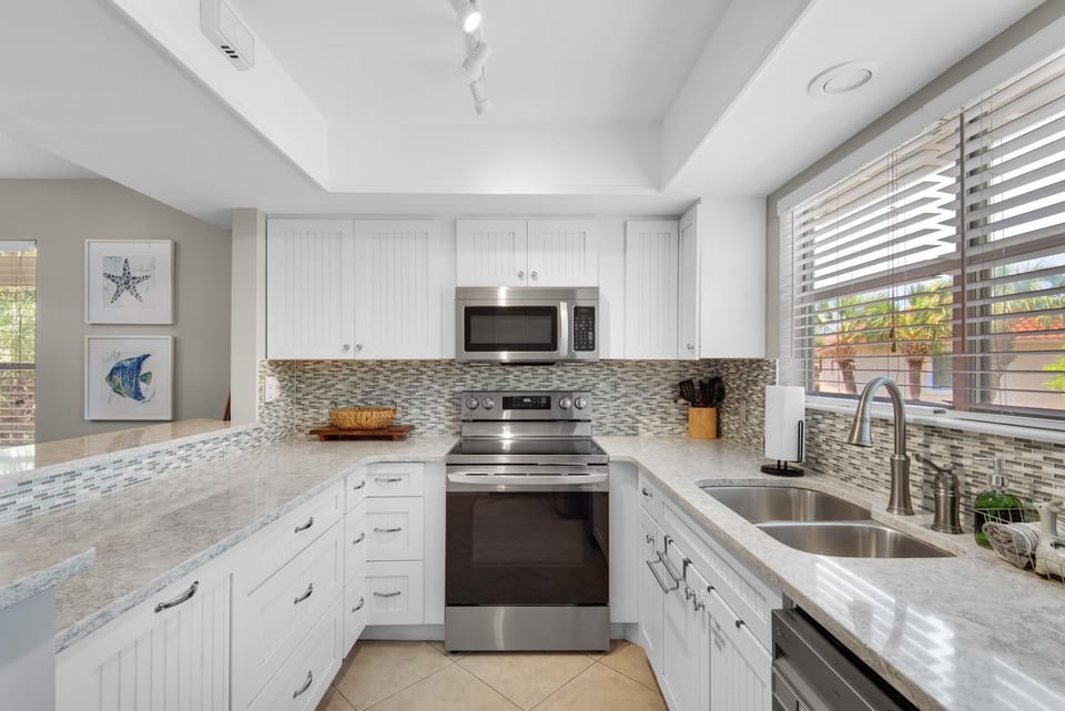 Condo, Multiple Beds (Hidden Dunes Beach Cottage 149) | Private kitchen | Oven, toaster