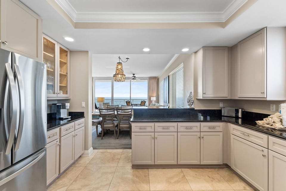Condo, Multiple Beds (Indigo West 1904) | Private kitchen | Oven, toaster, paper towels