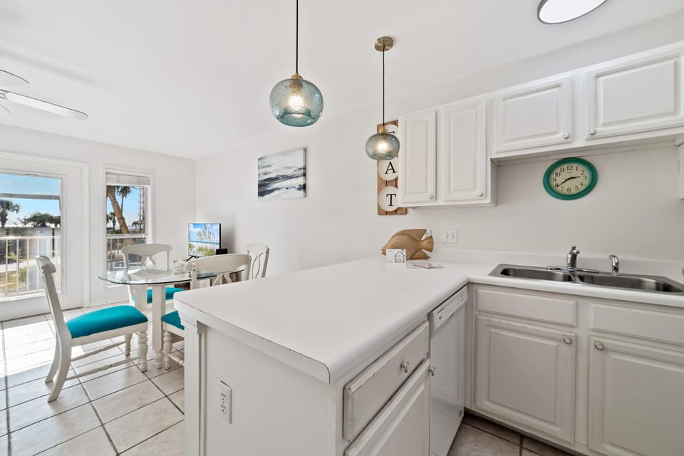 Condo, 1 King Bed with Sofa bed (Grand Caribbean West 205) | Private kitchen | Oven, toaster, paper towels
