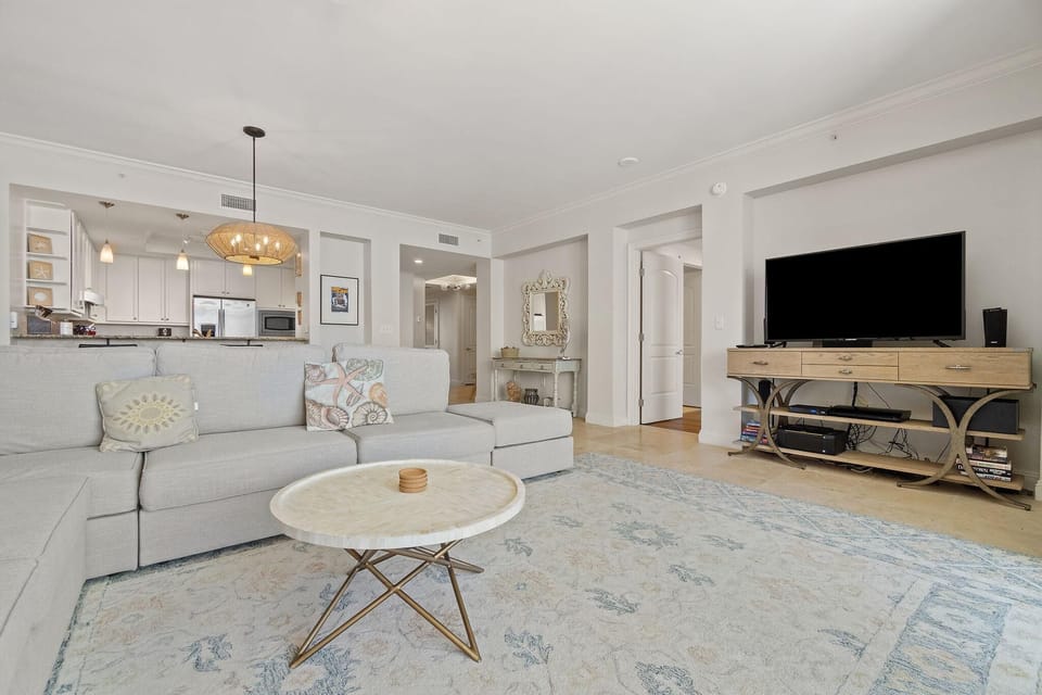 Condo, Multiple Beds (Indigo West 1202) | Living area | TV