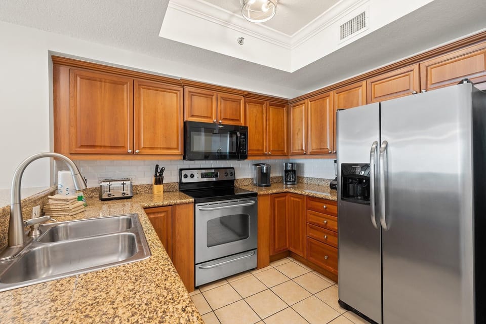 Condo, Multiple Beds (Seawind 1302) | Private kitchen | Oven, toaster, paper towels