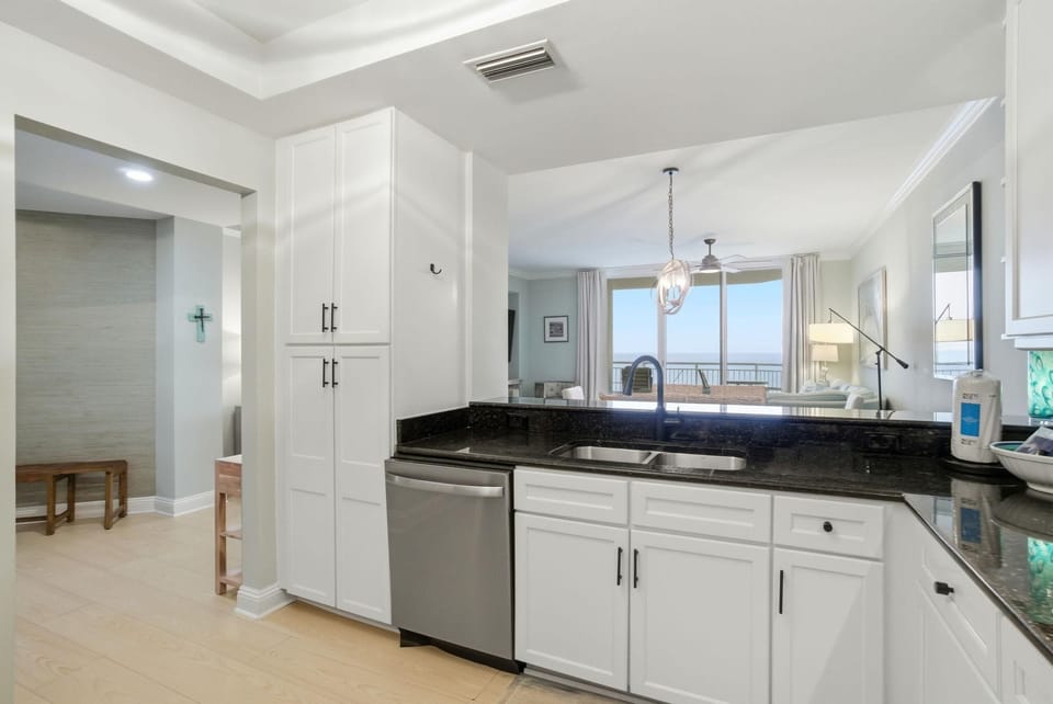 Condo, Multiple Beds (Indigo East 1802) | Private kitchen | Oven, toaster, paper towels
