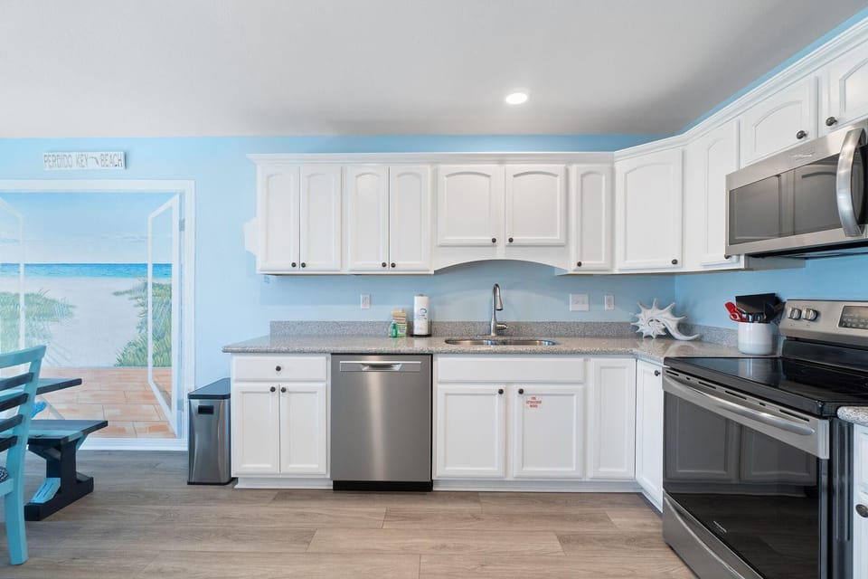Condo, Multiple Beds (Grand Caribbean East 114) | Private kitchen | Oven, toaster, paper towels