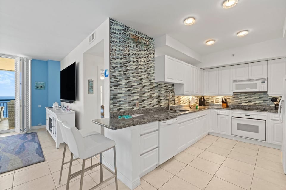 Condo, Multiple Beds (Beach Colony East 12B) | Private kitchen | Oven, toaster, paper towels