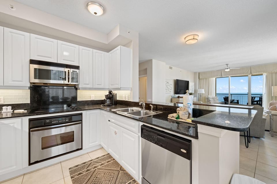 Condo, Multiple Beds (Beach Colony East 13D) | Private kitchen | Oven, toaster, paper towels