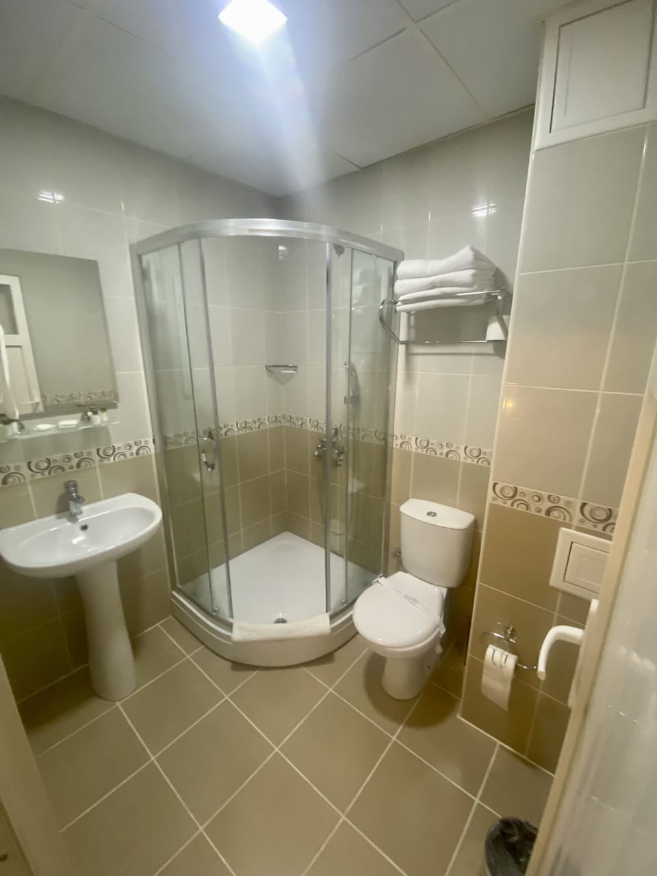 Economy Room, 1 Double Bed | Bathroom | Shower, hair dryer, slippers, towels