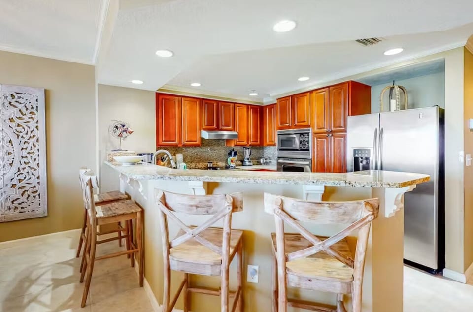 Condo, Multiple Beds (Colonnades 1402) | Private kitchen | Oven, toaster, paper towels