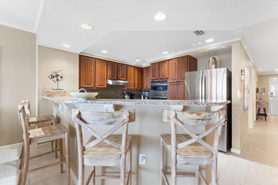 Condo, Multiple Beds (Colonnades 1402) | Private kitchen | Oven, toaster, paper towels