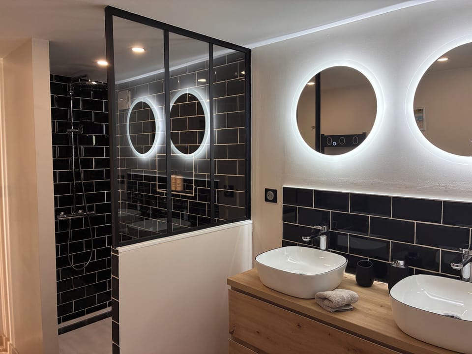 Family Room, 1 King Bed with Sofa bed, Terrace, Pool View (Omaha Beach) | Bathroom | Shower, hydromassage showerhead, designer toiletries, hair dryer
