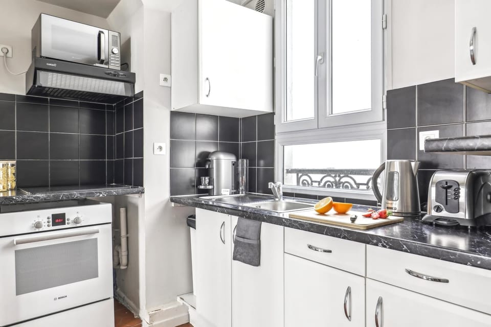 The kitchen is fully equipped to prepare a simple meal