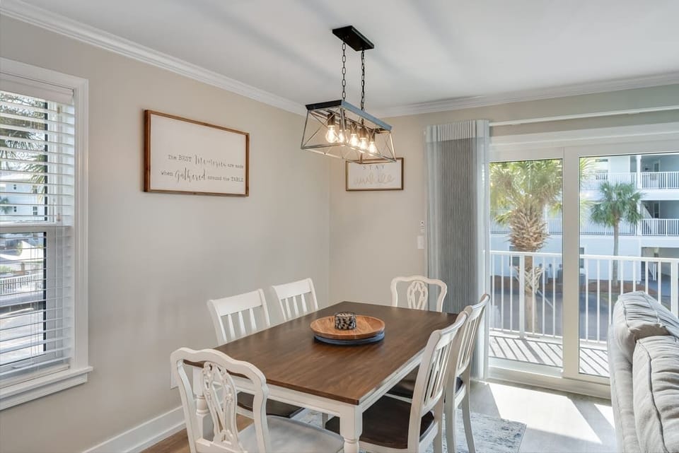 Gather 'round our spacious dining table for six